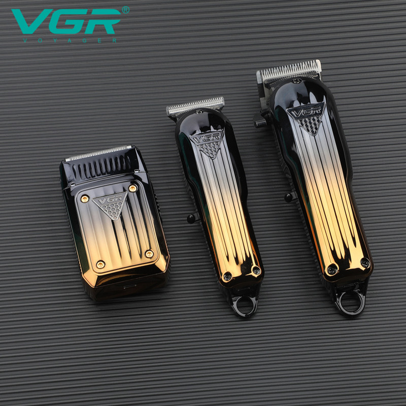 مجموعه سه عددی ماشین اصلاح موی سر و صورت وی جی ار مدل V-644 با تیغه تیتانیوم و استیل ضد زنگ، قابلیت اصلاح صفر، خط زن و حجم زن، باتری لیتیومی با زمان استفاده تا 200 دقیقه، طراحی ارگونومیک و عملکرد خشک و مرطوب و نمایشگر وضعیت باتری