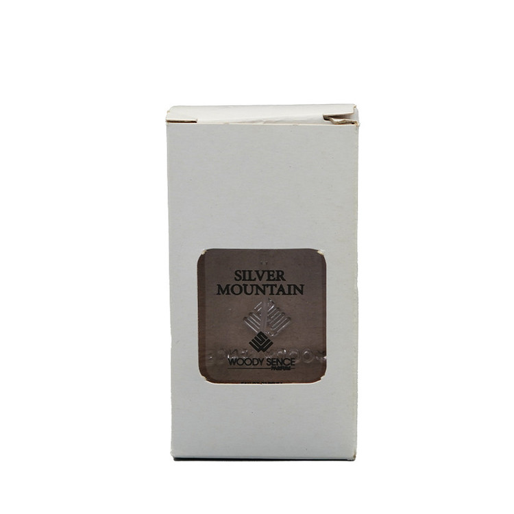 عطر جیبی مردانه وودی سنس مدل silver montian با رایحه خنک حجم 30 میلیلیتر