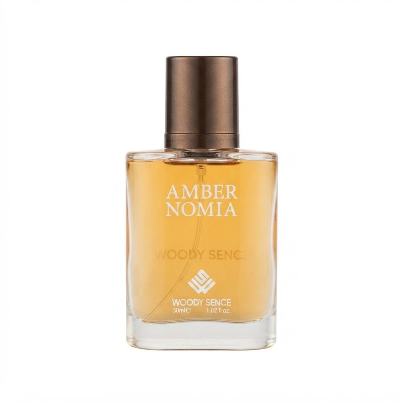 عطر جیبی وودی سنس مدل Amber Nomia با رایحه تلخ و چوبی حجم 30 میلی‌لیتر
