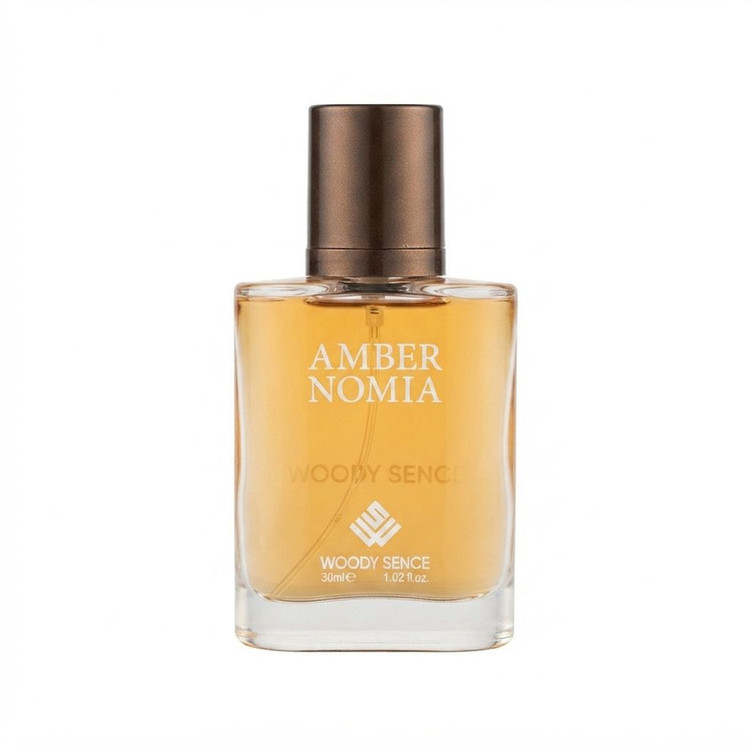 عطر جیبی وودی سنس مدل Amber Nomia با رایحه تلخ و چوبی حجم 30 میلیلیتر