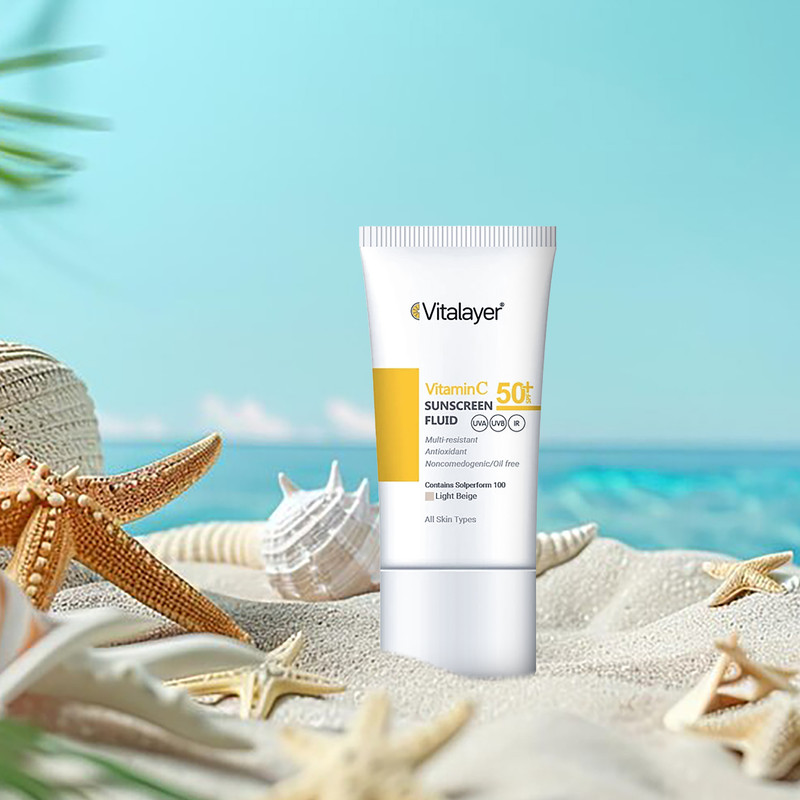 فلوئید ضدآفتاب رنگی ویتالیر، 50 SPF، مدل Vitamin C، مناسب انواع پوست تنالیته رنگ متوسط و حجم 50 میلیلیتر، ضد آب، محافظت کننده در برابر اشعه UVA، UVB، IR، آنتیاکسیدان، فاقد چربی و پارابن، ضد لک، آبرسان، دارای فرمولاسیون غیرکومدونزا، با ماندگاری 2 ساعته